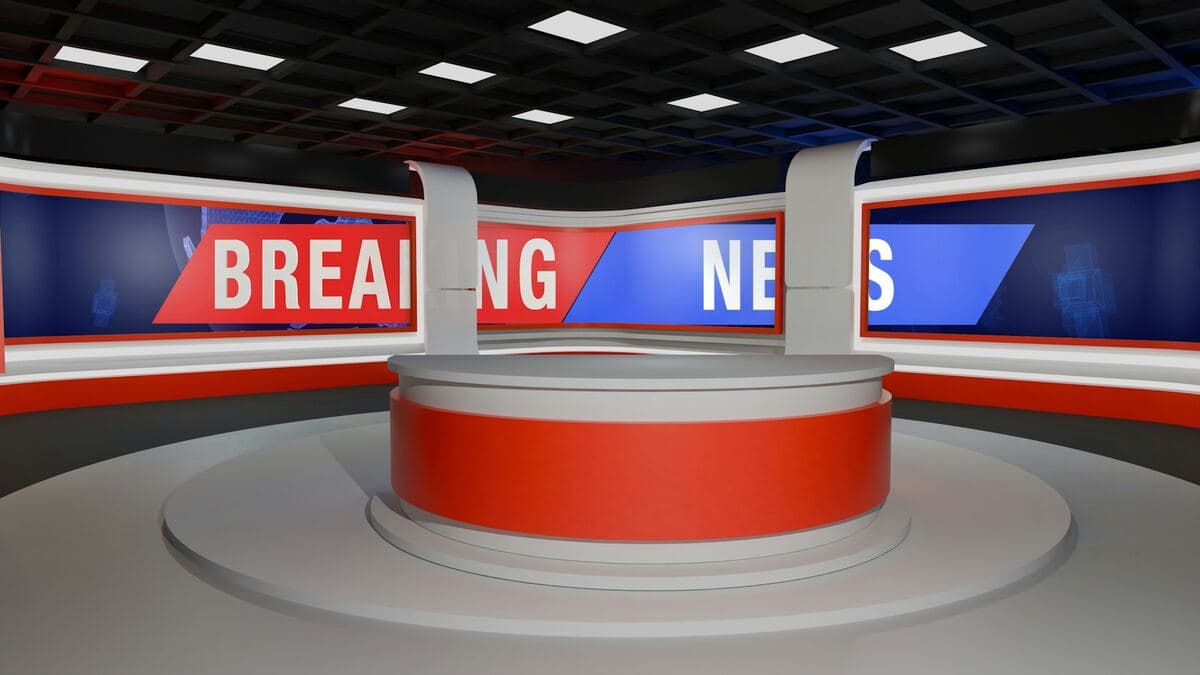 Broadcast studio control room with multiple live monitors