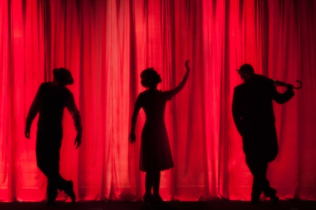 Theater auditorium with warm stage lighting